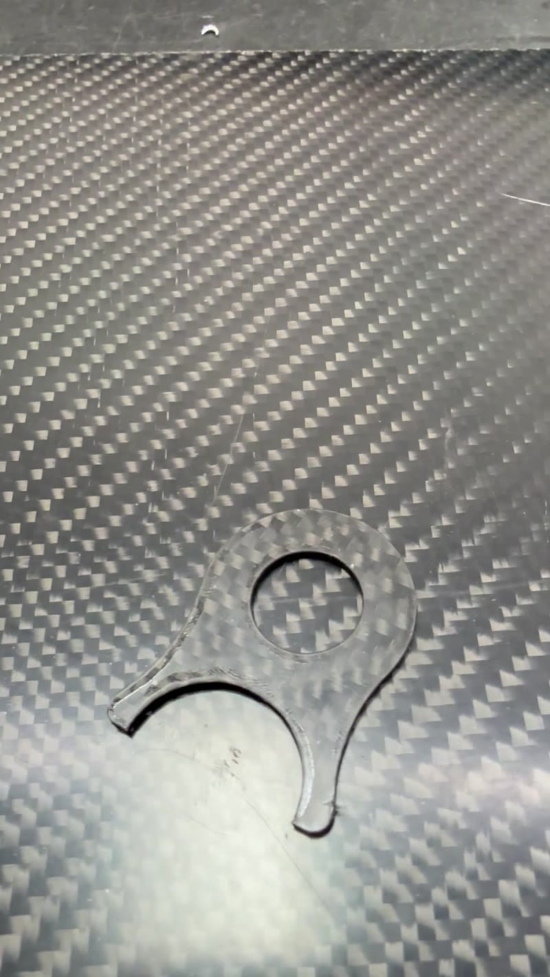 Carbon fiber bracket cut to shape