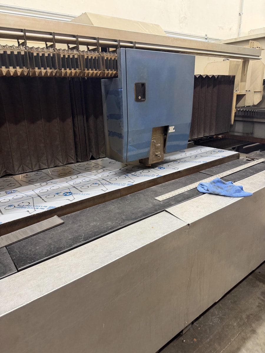 Wide shot of the CO2 laser machine in the shop